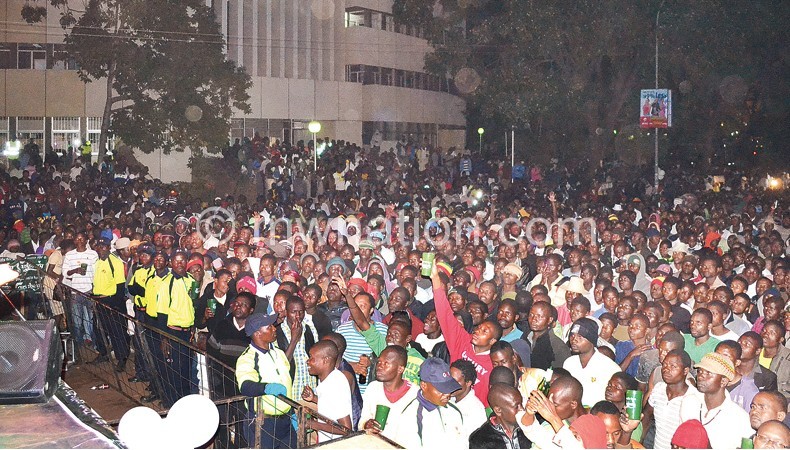 A section of the crowd revels in the Carlsberg moment in Blantyre, Mponela will