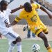 Diof Somaone (R) of KB tries to beat Isaac Kaliati of Azam Tigers