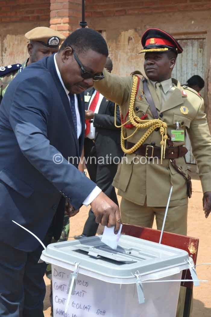 Pres Peter Mutharika casts his ballot at Goliati Primary School
