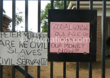 Some of the placards posted at the gates of the High Court of Malawi and Malawi Supreme Court of Appeal premises in Blantyre