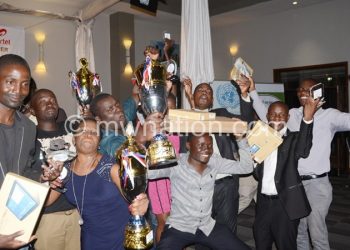 Winning team: NPL journalists celebrate the Media House of the Year accolade