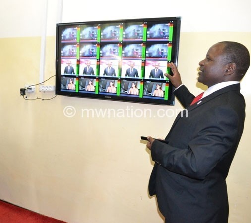 Chirwa demonstrating how the digital migration stystem will work