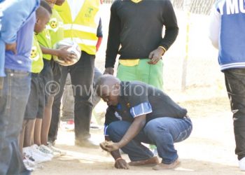 A nomads fan captured removing top soil near the dressing room on suspicion that it contained charms to cast a spell on his team during their league game against Bullets