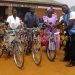 Mwandira handing over bicycles to community educators
