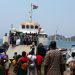 People from Likoma boarding a 
boat to the mainland