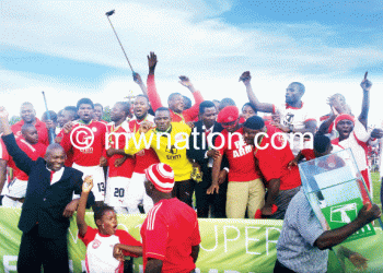 BB players and officials celebrate after being crowned champions