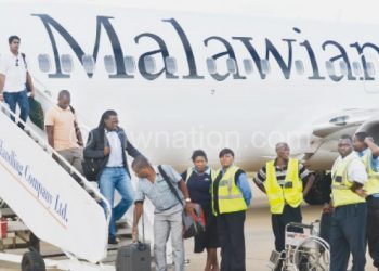 A Malawi Airlines aircraft at the airport
