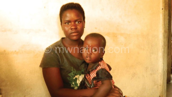 Picked by police: Banda with her baby