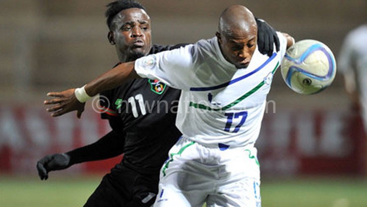 Flames striker Frank ‘Gabadinho’ Mhango (No. 11) in action against Lesotho