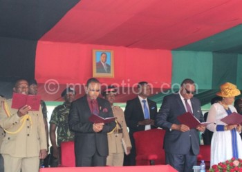 Mutharika and Vice-President Saulos Chilima join in the singing