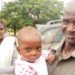 Baby Siyireni with her father after the operation