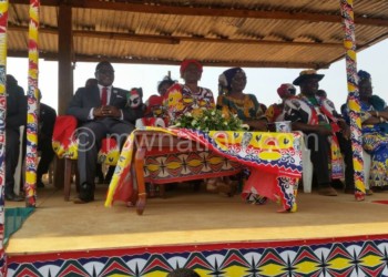 Chakwera (L) and other guests enjoy traditional dances before addressing the rally