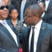 Mutharika speaks with Justice Minister Samuel Tembenu at the meeting