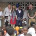 Banonie Mwale Foundation officials and benefactors interact with children
