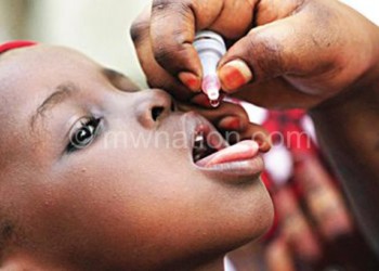 A child gets the oral vaccine