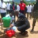 Muluzi washes hands at the event