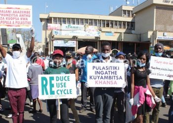 Civil society members protest the production of thin plastics