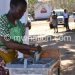 A woman casts her vote in the May 21 2019 Tripartite Elections
