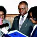 Kachale (C) takes oath of office yesterday as his wife, Mary, looks on