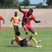 Scorer of Malawi’s both goals Mphasi evades a tackle