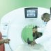 Chiponda (L) commissions a CT scanner at QECH