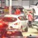 Vehicles queue to refill at a filling station