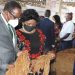 Chakwera and the First Lady admire tobacco at the auction floors