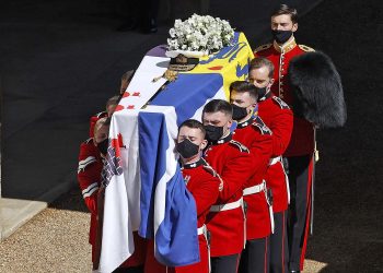 Britain’s Royal Marines carry the Phillip’s coffin 
into St. George’s Chapel