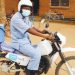 Munyonga on the motorcycle that led to the reopening of Mselema clinic