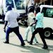 Plain-clothed police officers enforcing mask wearing in Blantyre