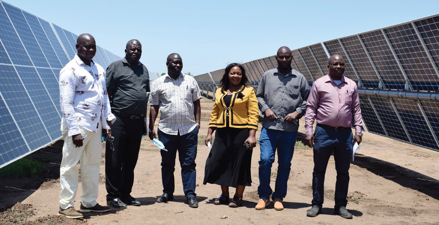 Chilenga (2nd L) and other committee members during their tour of JCM Solar Power Plant in Golomoti, Dedza