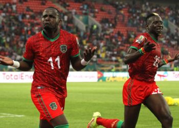 Mhango (L) and Muyaba celebrate one of the goals against Zimbabwe
